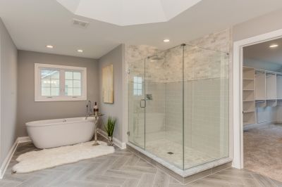 Contemporary walk-in shower with glass enclosure